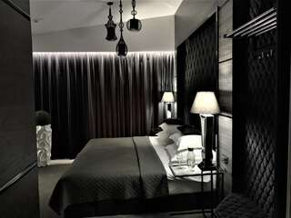 Отель Hotel Fado OZONOWANY Гожув-Велькопольски Люкс с кроватью размера «king-size»-1